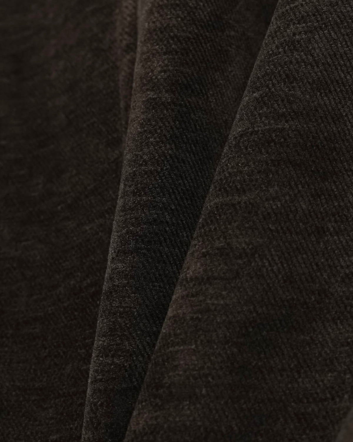Close-up of brown velvet fabric texture