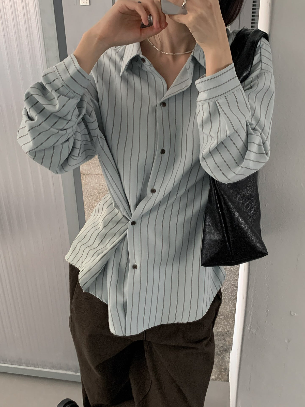 Rowsatnd striped long sleeve shirts in Ivory, Pastel Green and Sky Blue on hangers.