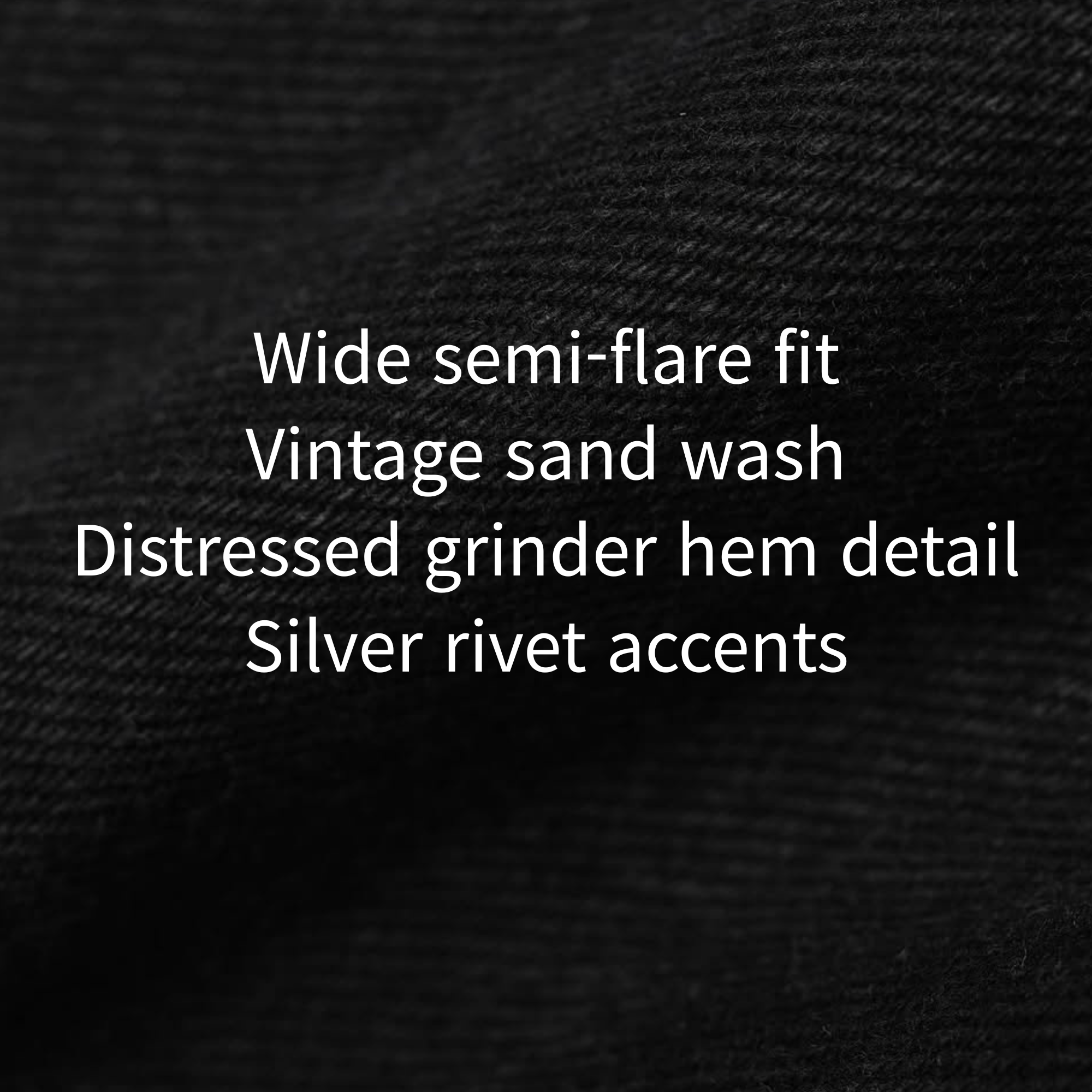 Jeans in denim neri svasati con orlo effetto "grinder"