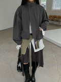 Women's charcoal high-neck zip-up jacket with front pockets, front view