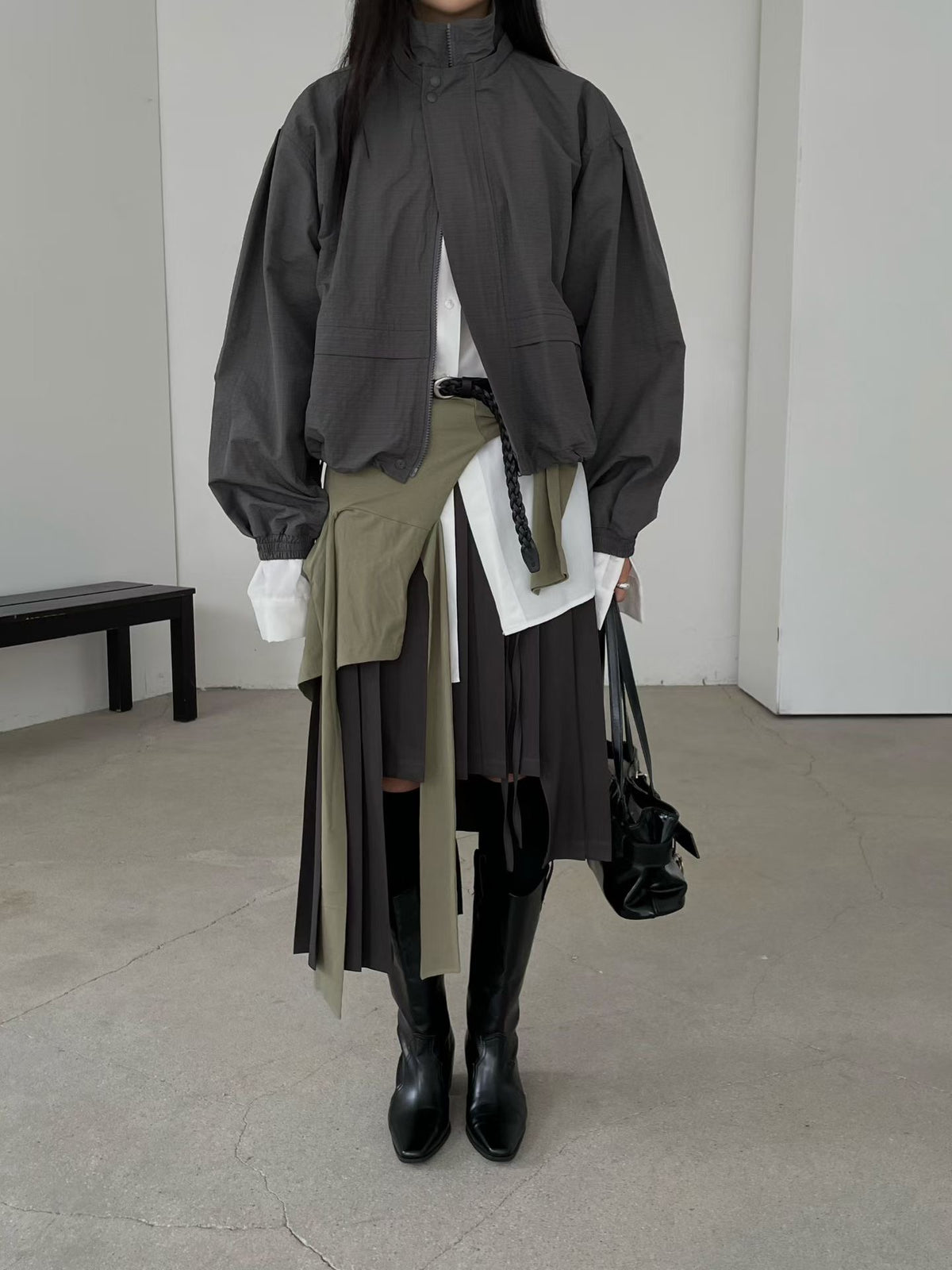 Front full-length outfit with charcoal zip-up jacket and black knee-high boots