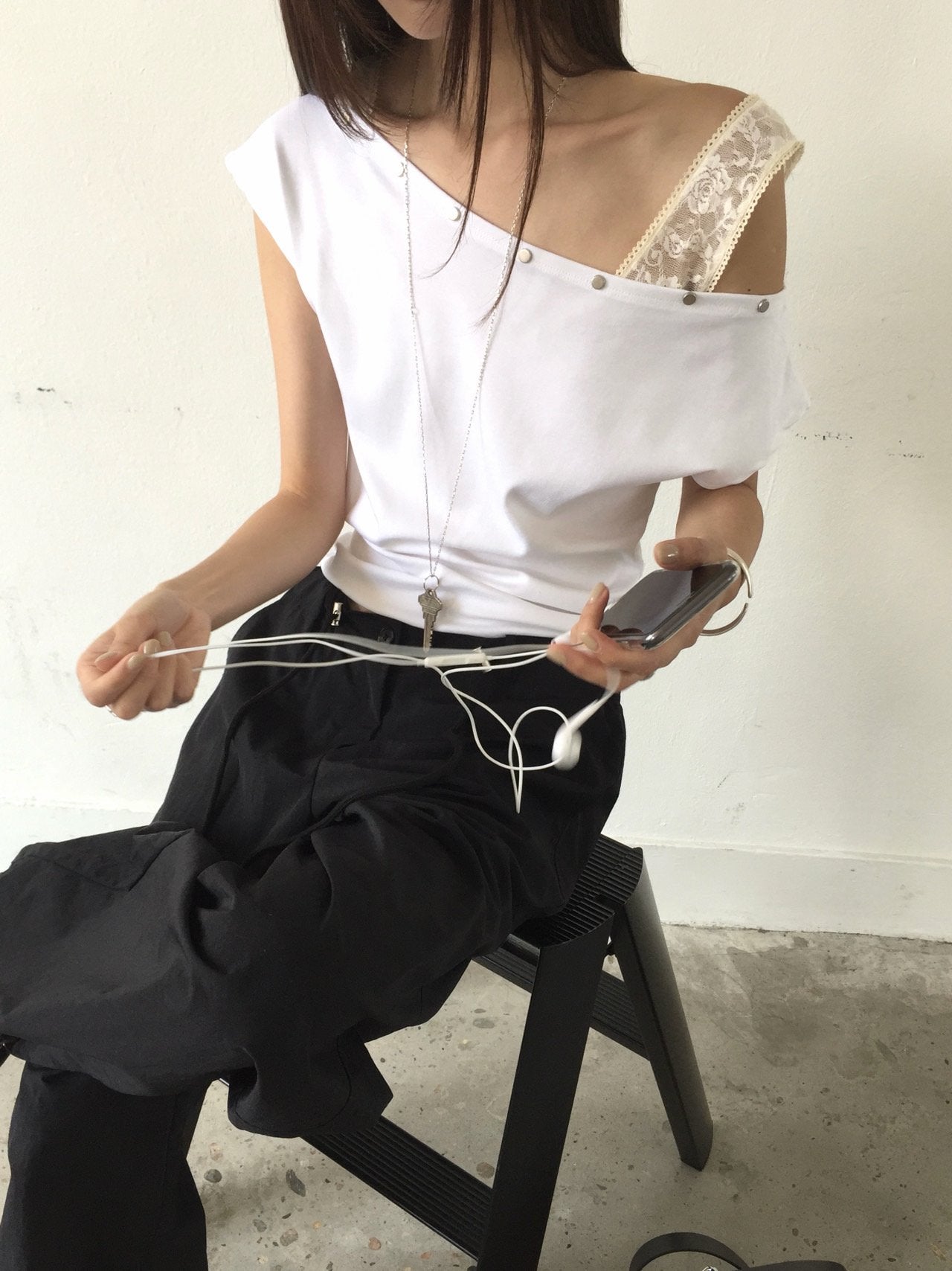 Nweol asymmetric one-shoulder top in Ivory, front view standing full length