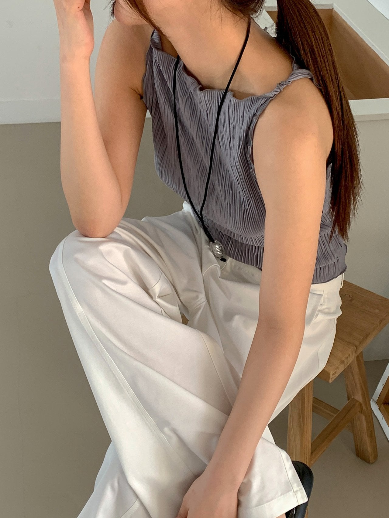 Moment pleated boat neck tank top, four colorways flat lay — Black, Blue-Grey, Light Khaki, Ivory