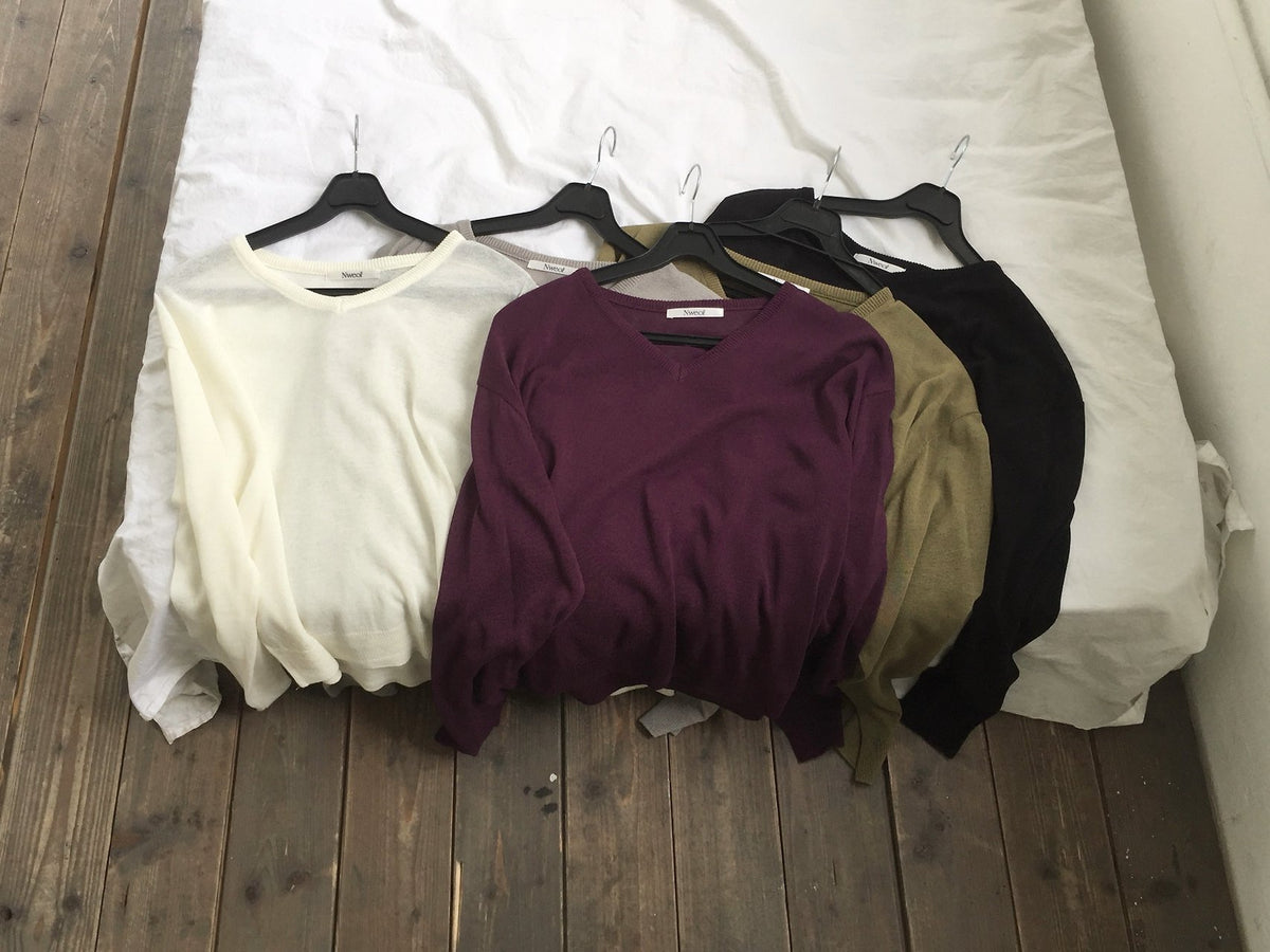 Nweol V-Neck Drop Shoulder Oversized Knit Sweater