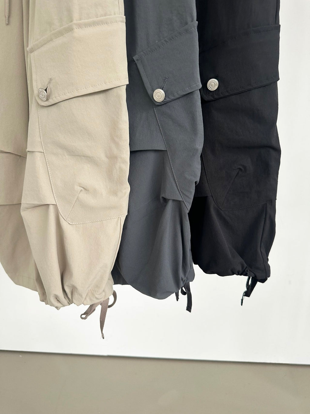 ASKHAKI Wide Leg Cargo Bermuda Shorts with Flap Pockets and Drawstring Hem
