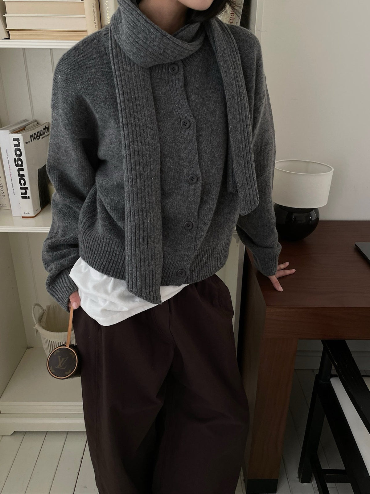 Close-up of ivory, khaki and charcoal knit textures