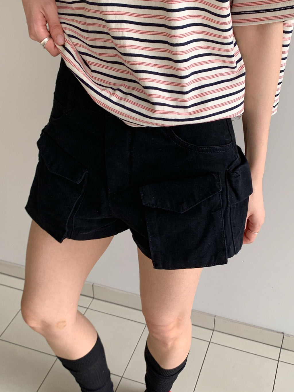 Vive L cargo shorts in Brown, front view styled with ribbed tank top