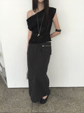 Nweol low rise zip pocket maxi skirt in Black, styled on model front view with black crop top