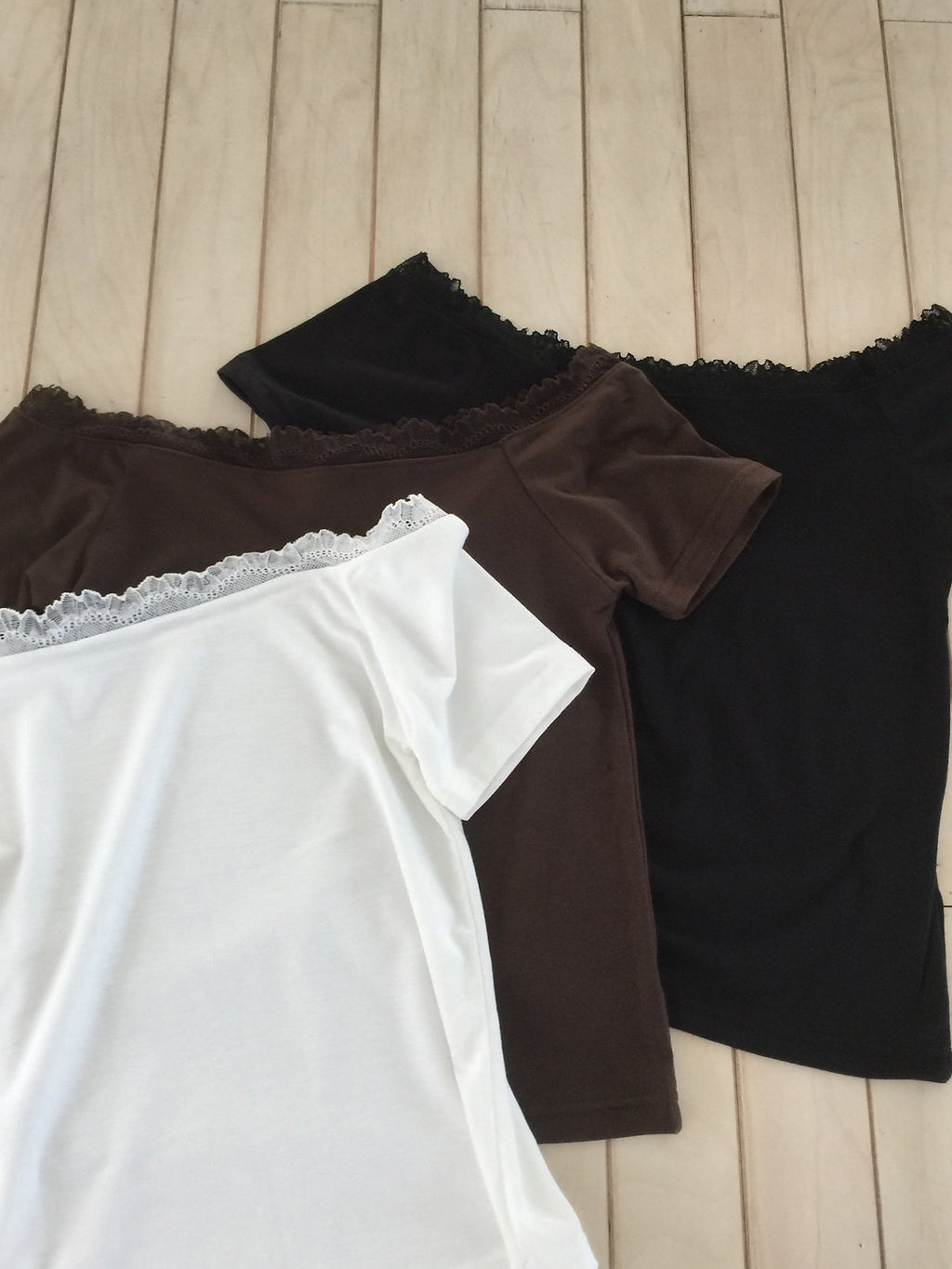Nweol lace trim off-shoulder top in Brown, front view standing styled