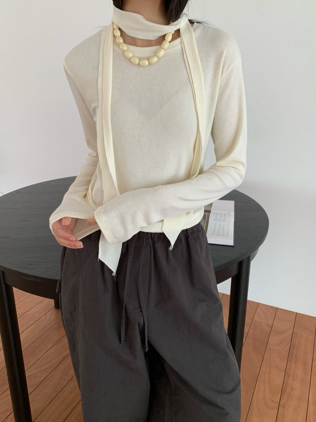 Charcoal scarf top set styled with trousers