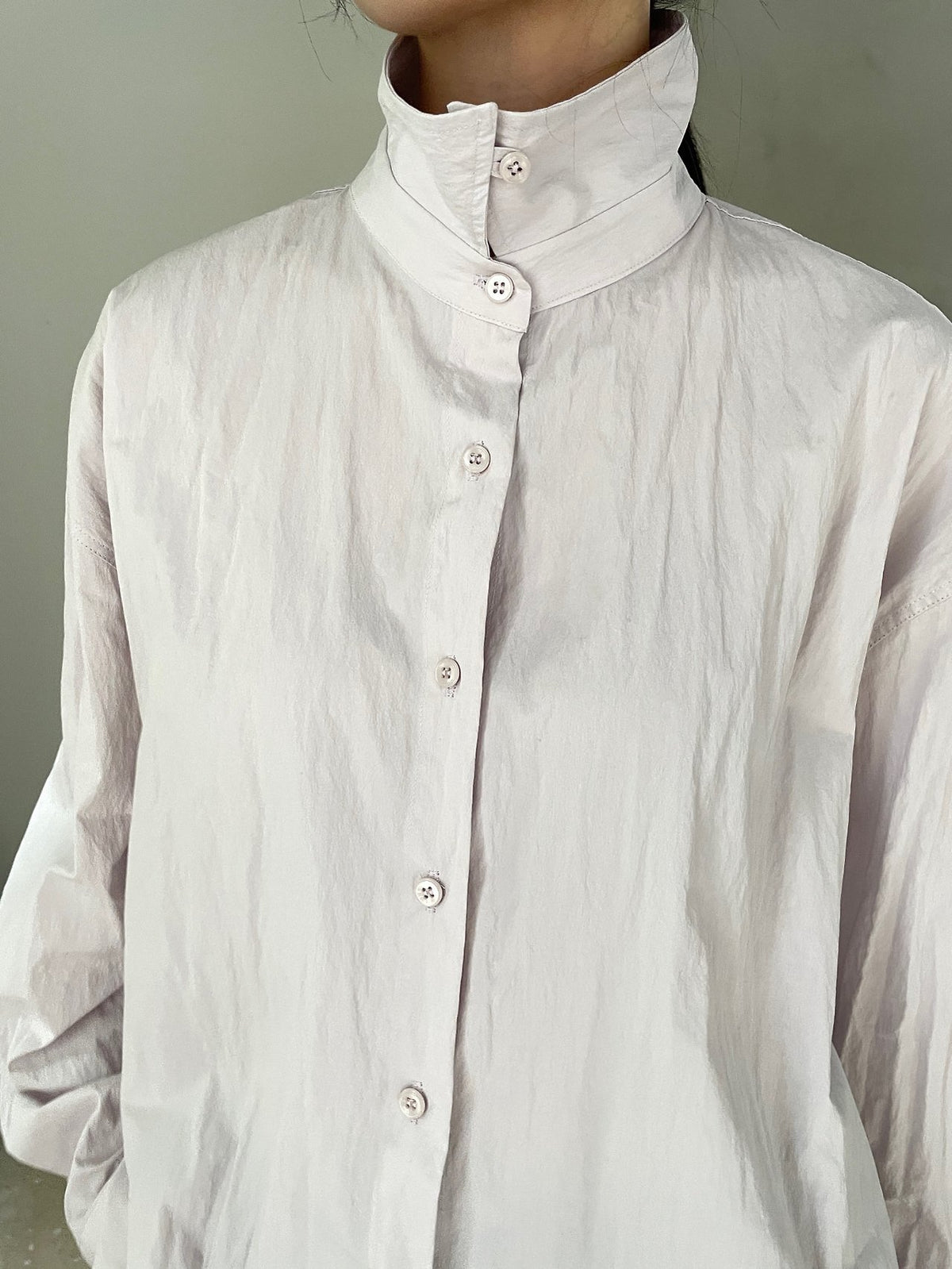 Ivory belted shirt front view