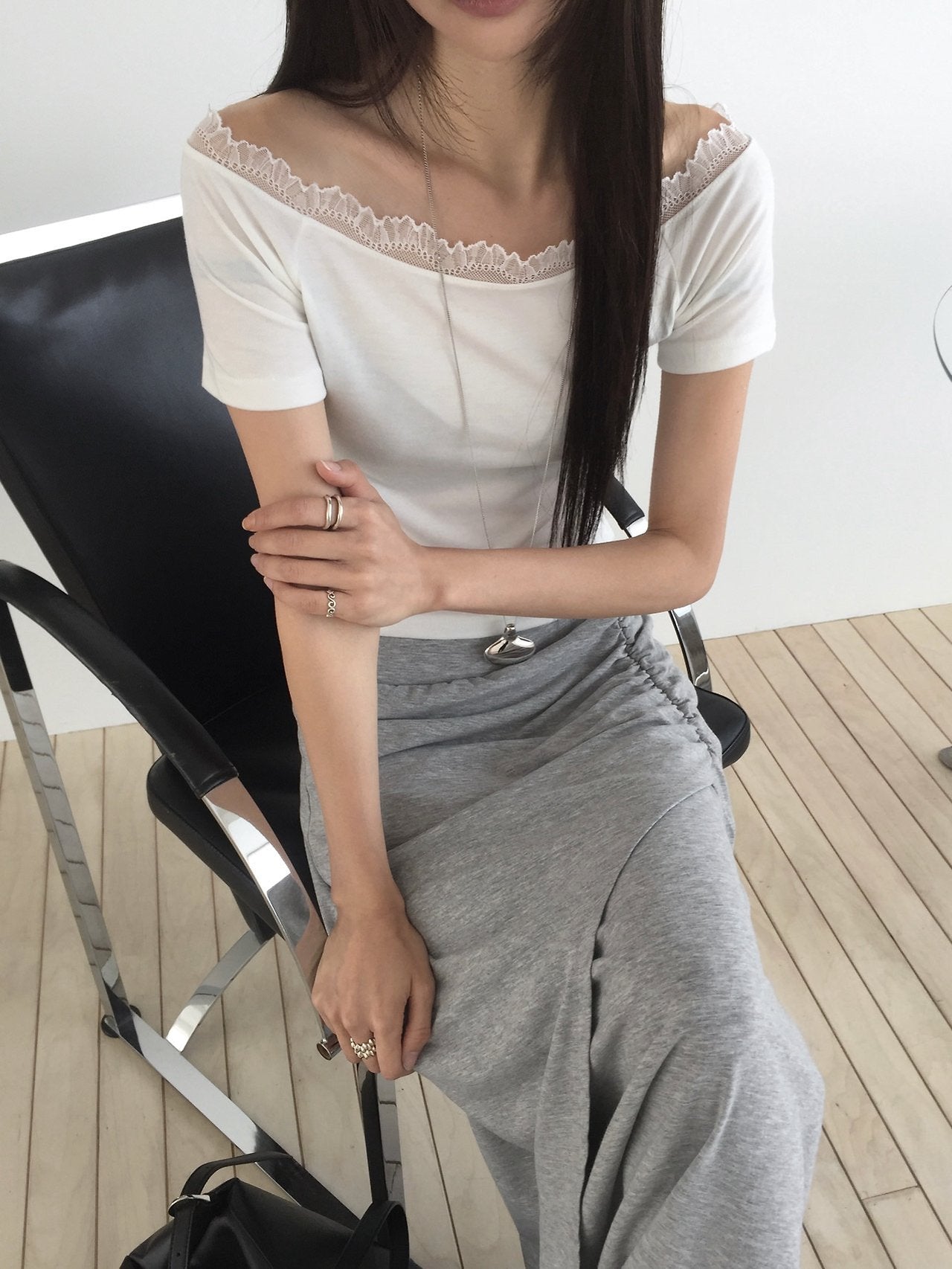 Nweol lace trim off-shoulder top, three colorways flat lay — Ivory, Brown, Black