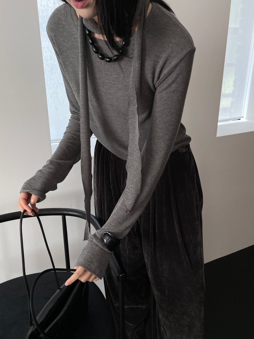 Ivory scarf top set styled with trousers