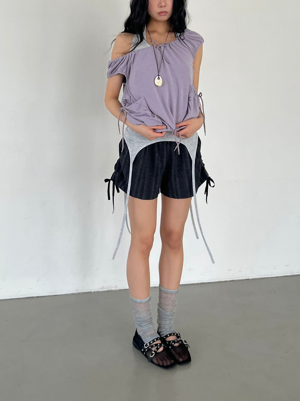 ASKHAKI Off-Shoulder Wide Neck Drawstring Ruffle Pocket Cropped Top