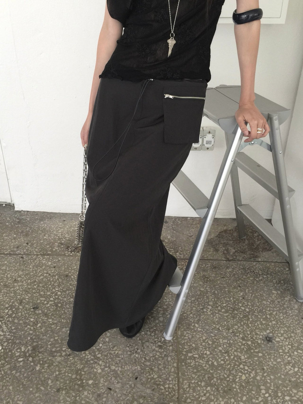 Nweol low rise zip pocket maxi skirt in Black, zip pocket and drawstring waistband close-up