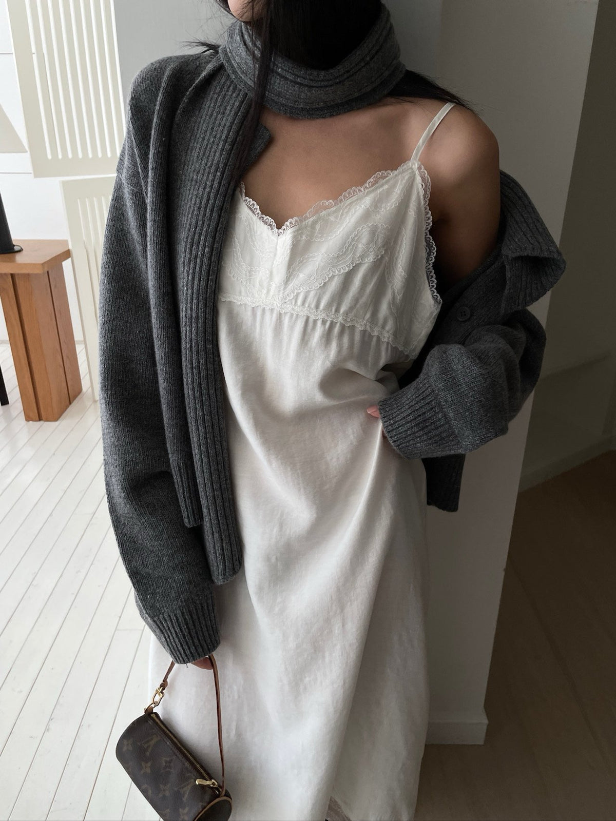 Side and back view of ivory cardigan with matching scarf