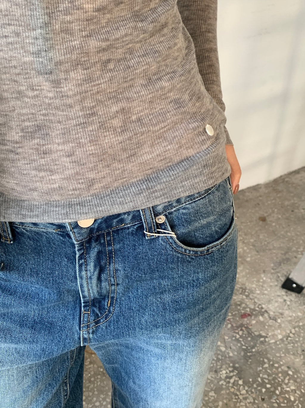 Close side view of brown turtleneck sweater