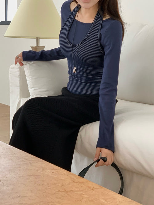 Front view of melange gray, brown, navy, and black layered top sets