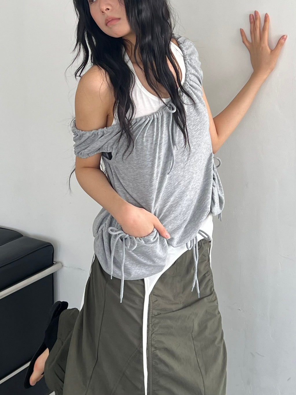 ASKHAKI Off-Shoulder Wide Neck Drawstring Ruffle Pocket Cropped Top