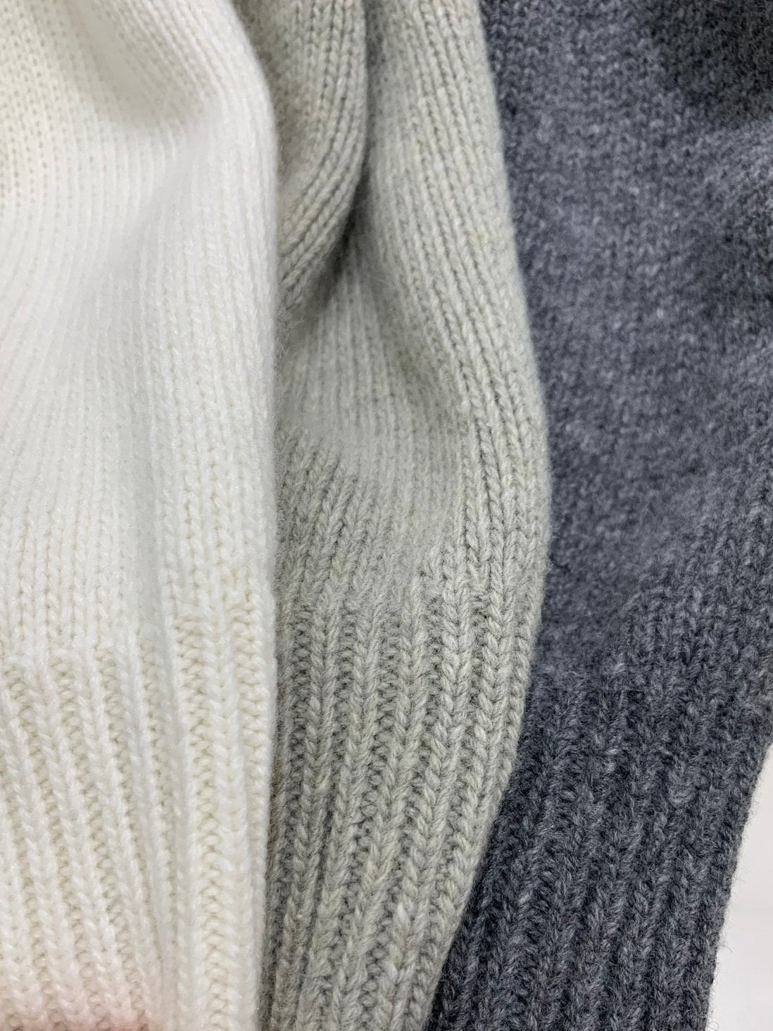 Ivory cardigan and matching scarf styled with blue jeans