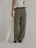 Moment curved seam wide leg pants, four colorways flat lay — White, Light Khaki, Beige, Black
