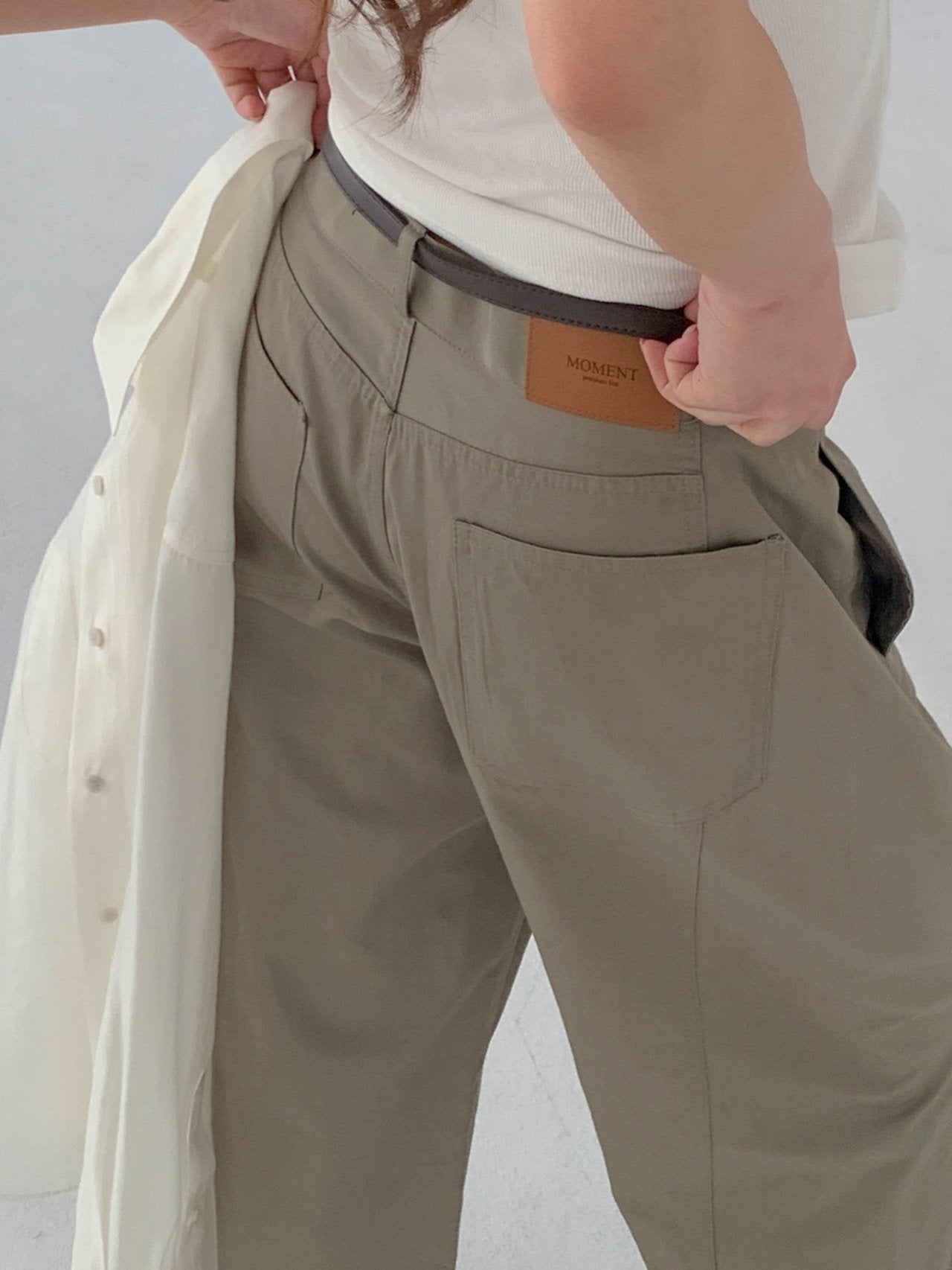 Moment curved seam wide leg pants in White, back view full length on model