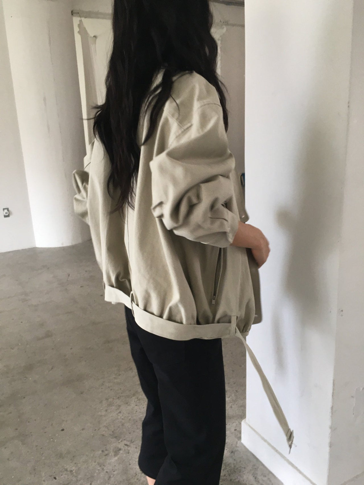 Khaki beige and navy bio-dyed cotton blouson jackets on hangers