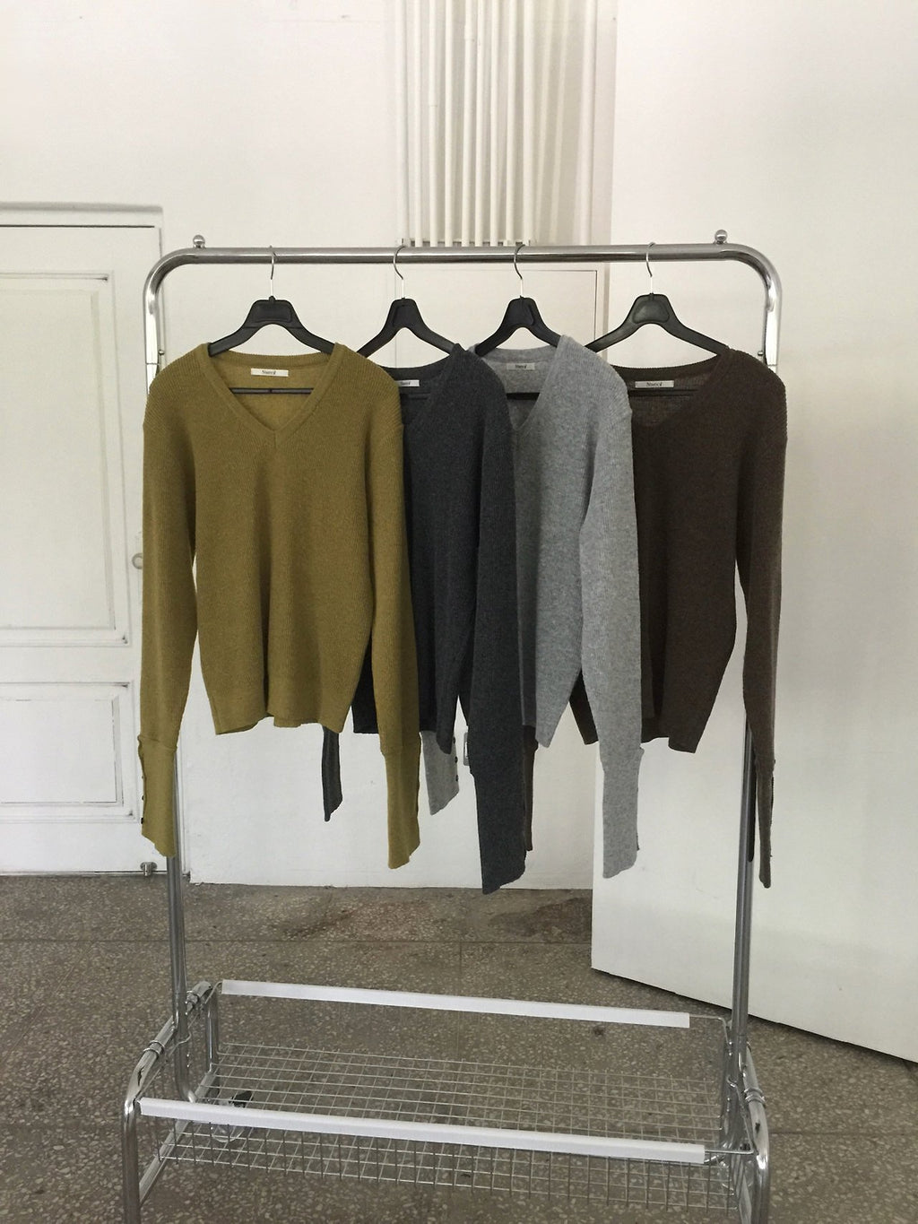 Nweol V-Neck Knit Sweater with Button Cuffs