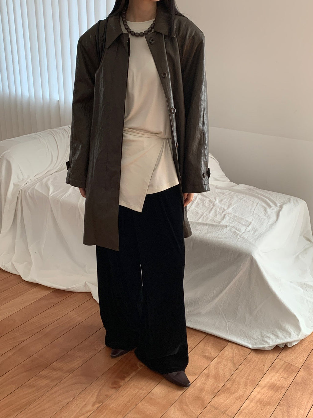 Cream wrap top set styled with trousers