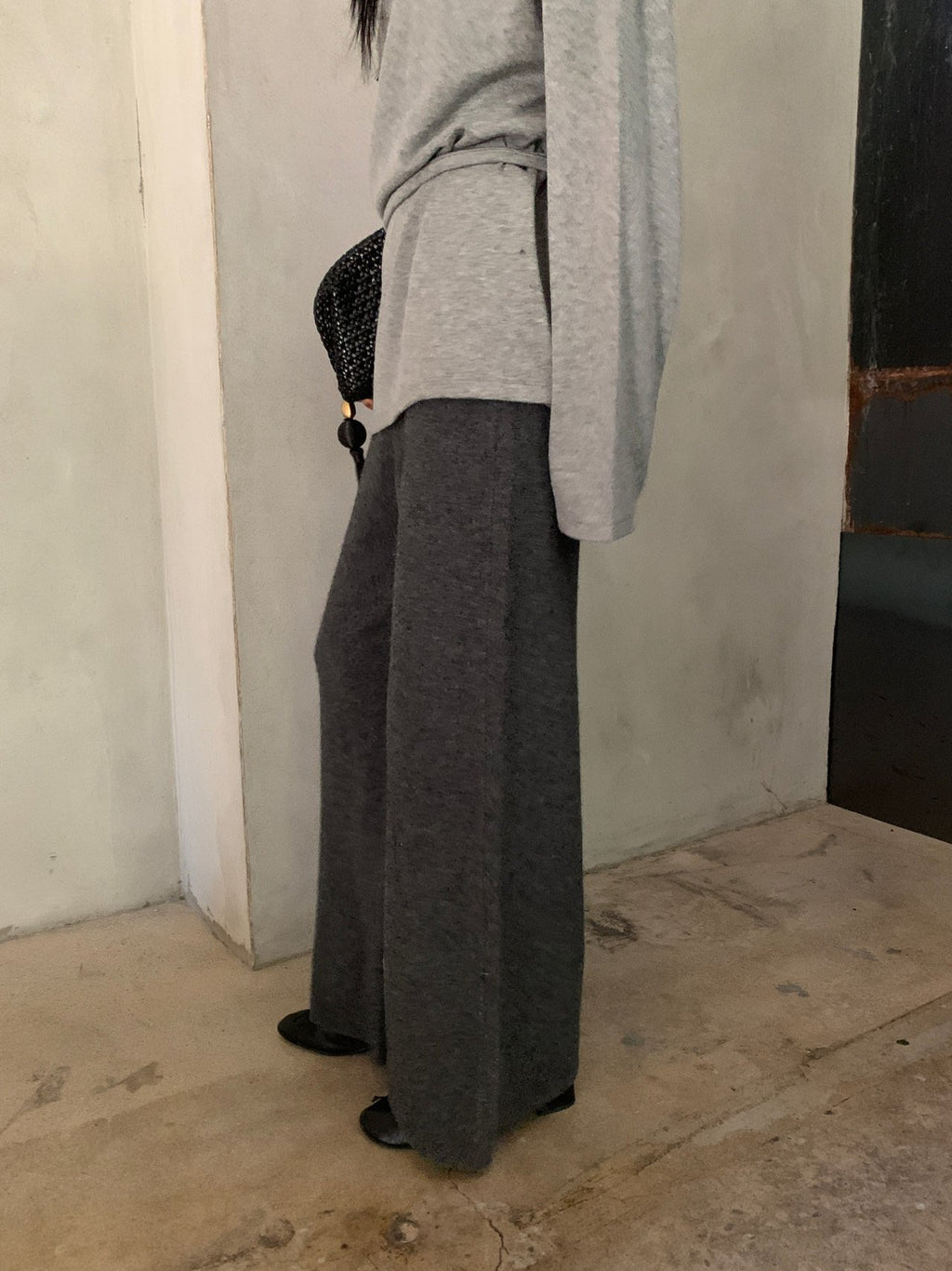 Close front view of brown wide-leg knit pants