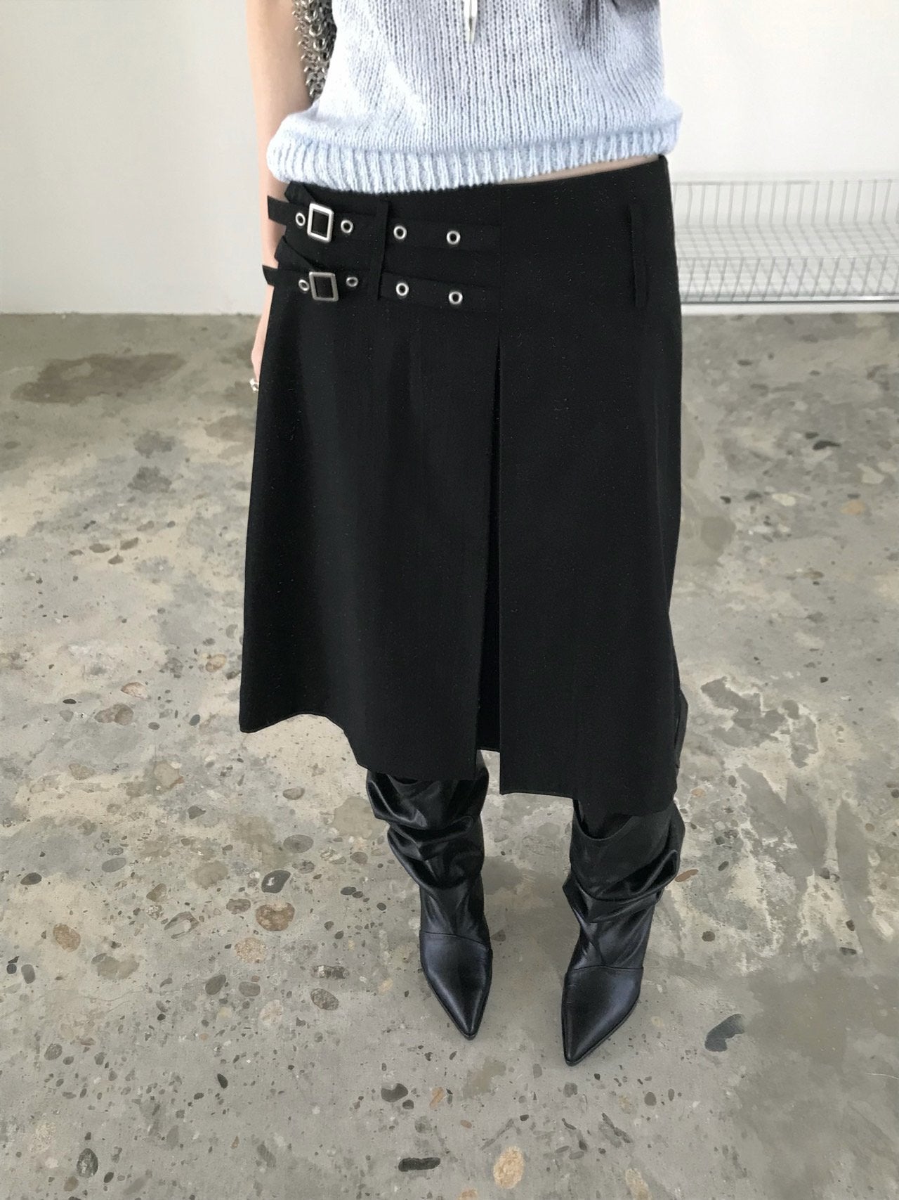 Newol Double Buckle Eyelet Pleated Midi Skirt — Asymmetric Hem