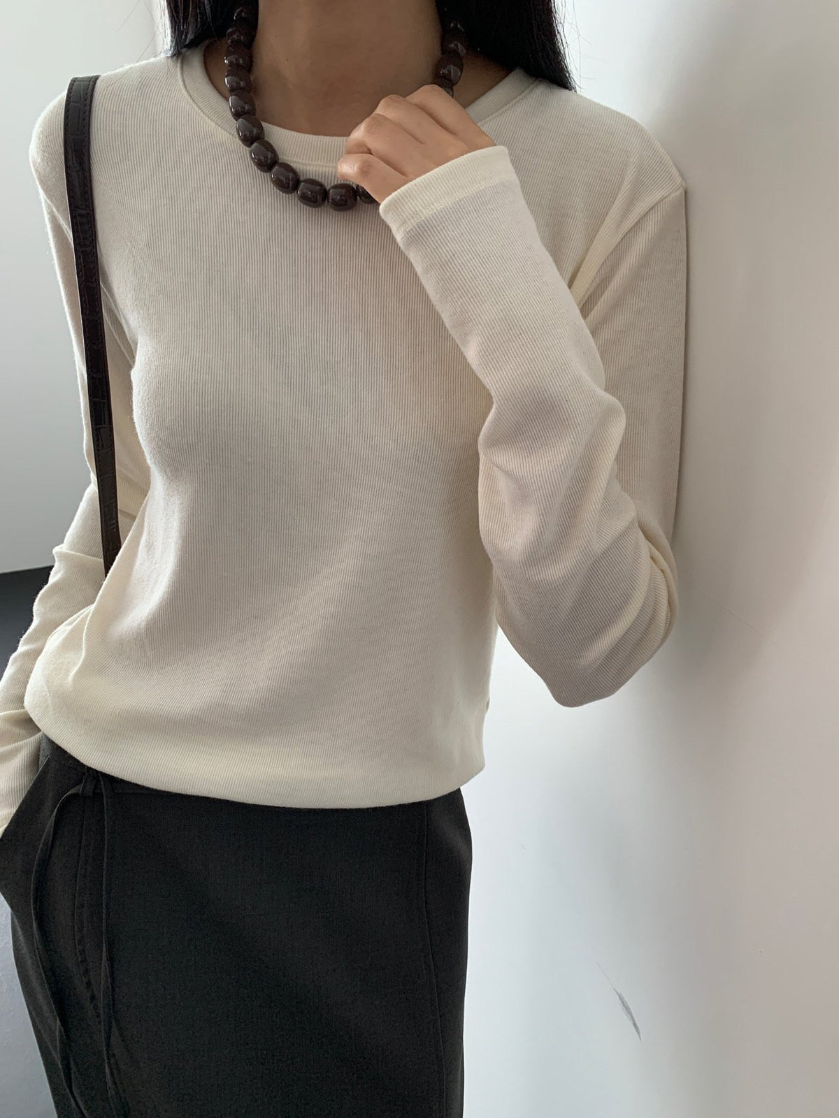 Black scarf top set styled with trousers