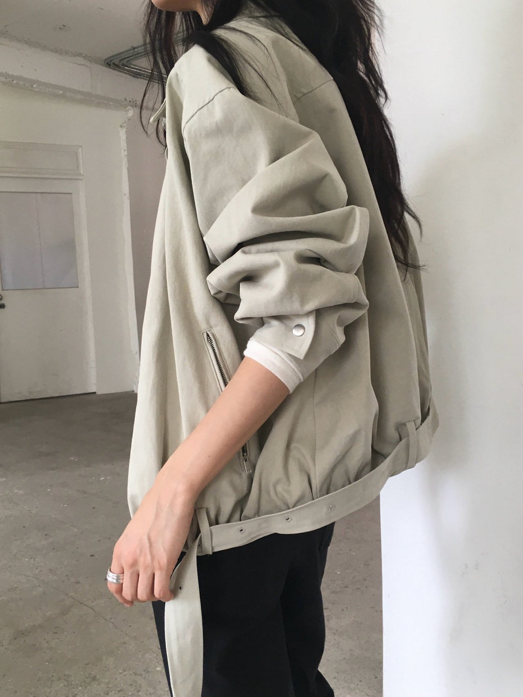 Side view of khaki beige cotton blouson jacket with pocket and cuff detail