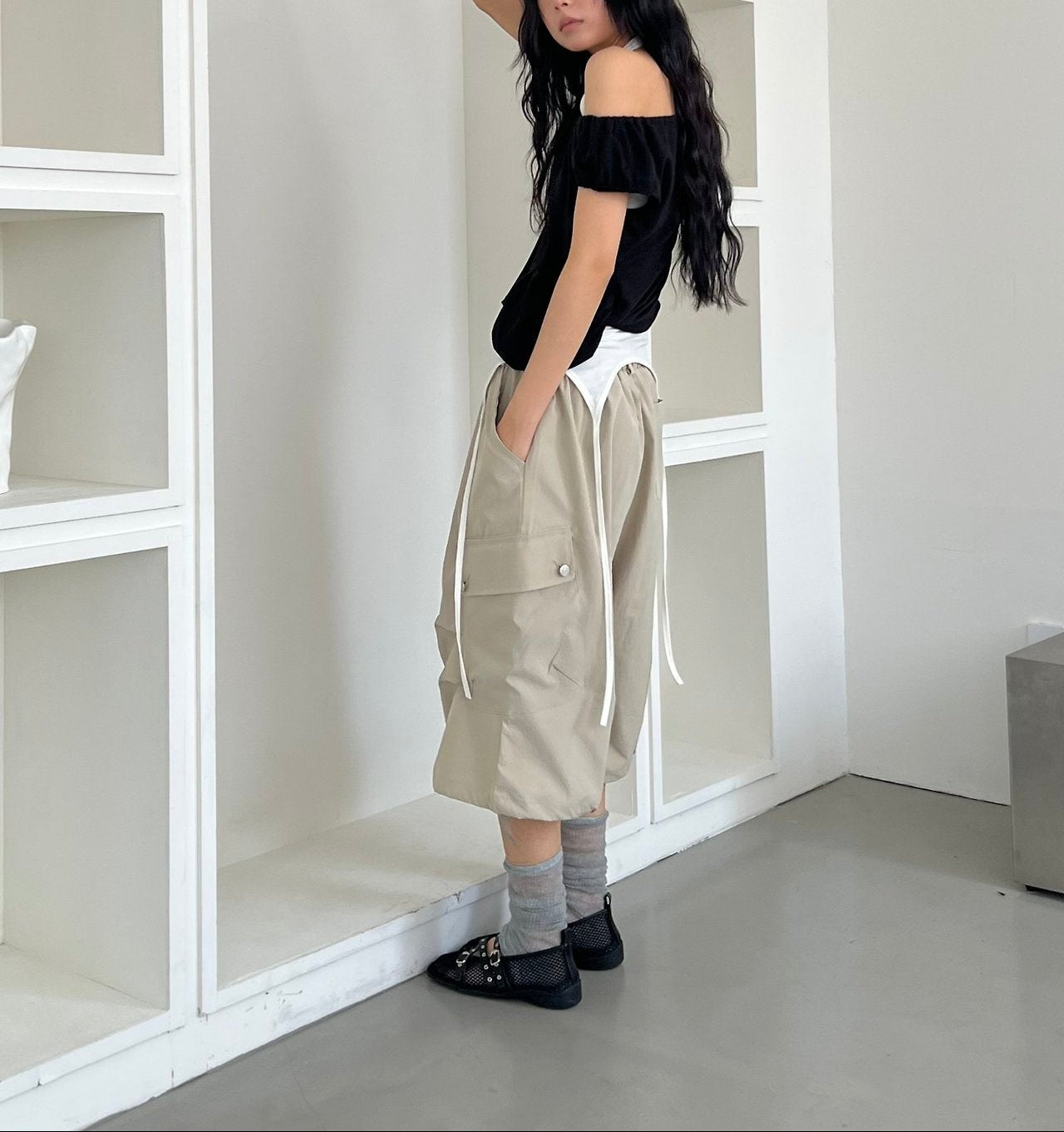 ASKHAKI Off-Shoulder Wide Neck Drawstring Ruffle Pocket Cropped Top