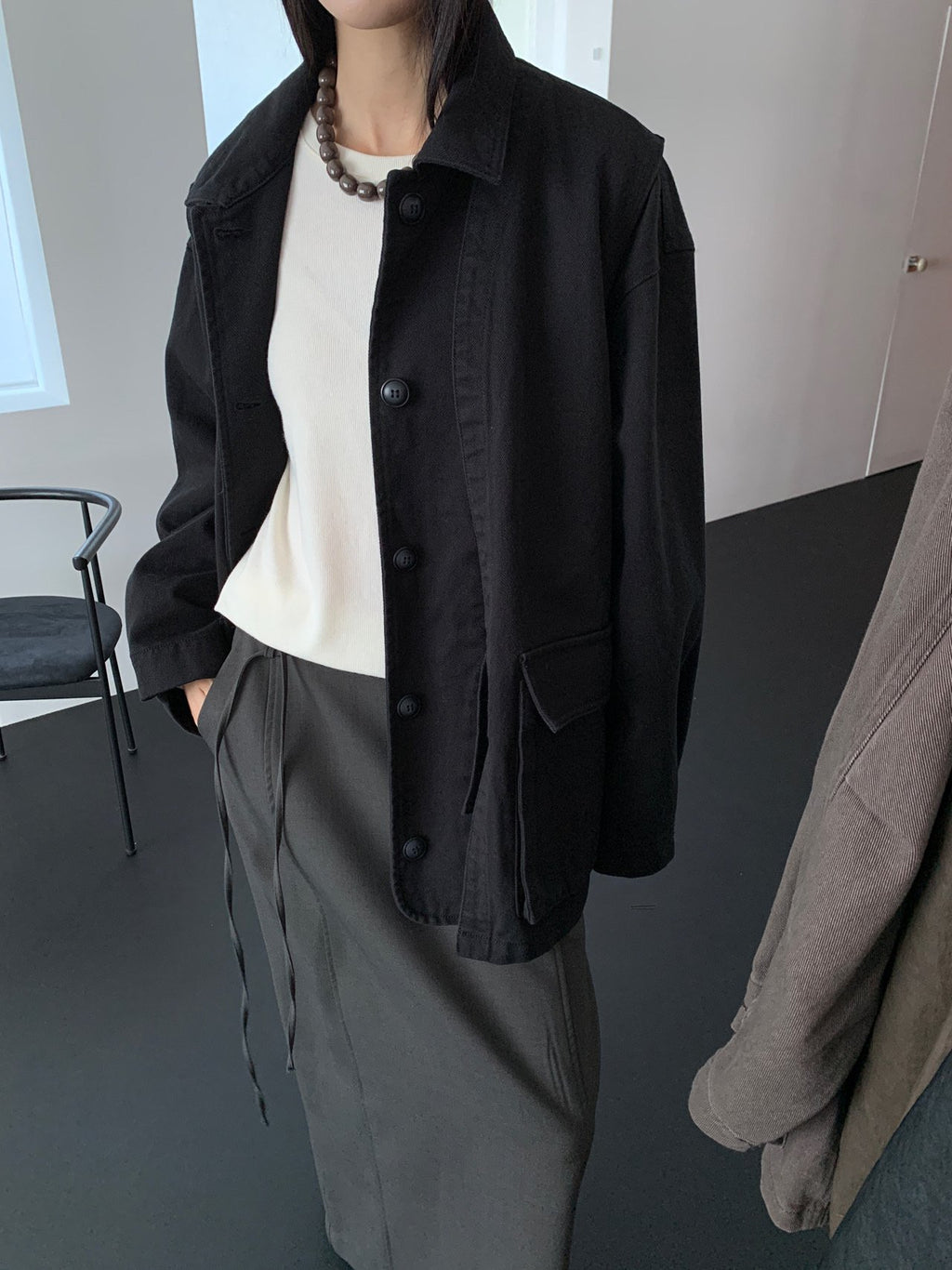 Brown workwear jacket back view