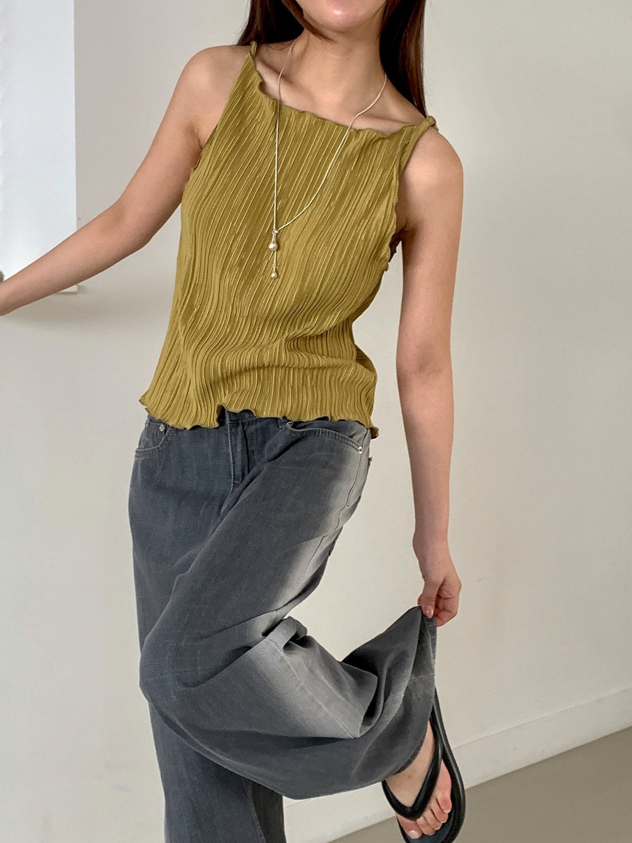 Moment pleated boat neck tank top in Blue-Grey, seated front view close-up