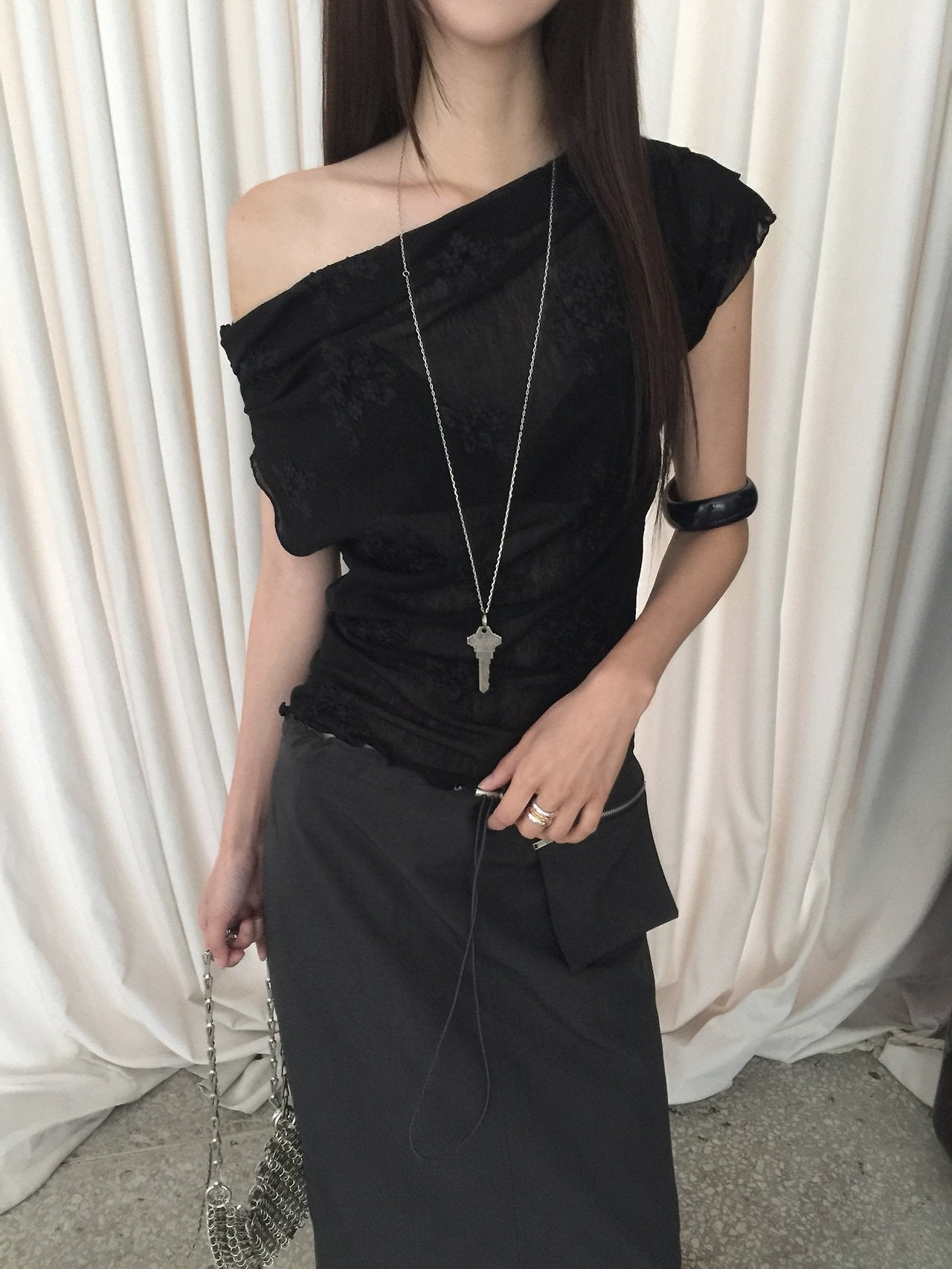 Nweol one-shoulder floral lace mesh top in Black, ruffle hem and mesh texture close-up