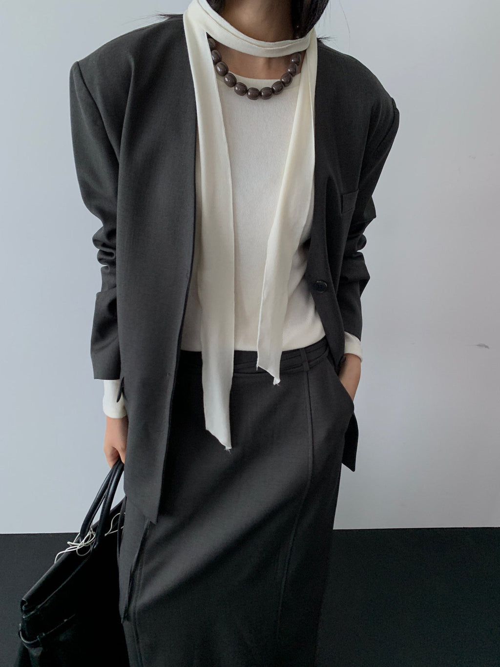 Close-up of Lucysalon ribbed top sleeve and fabric