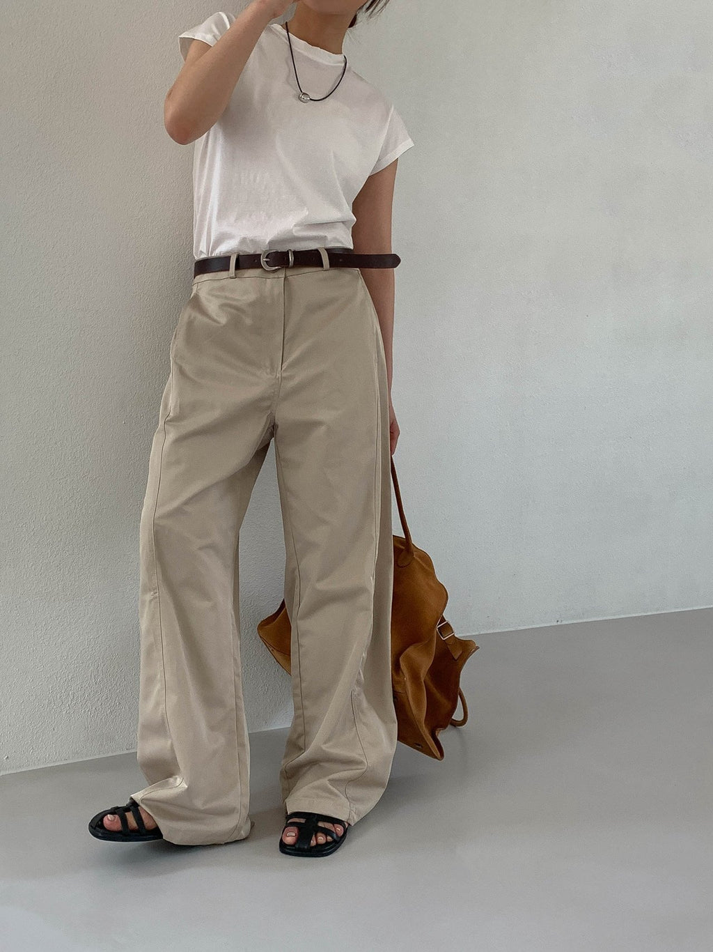 Moment curved seam wide leg pants in White, front view close-up waistband and seam detail