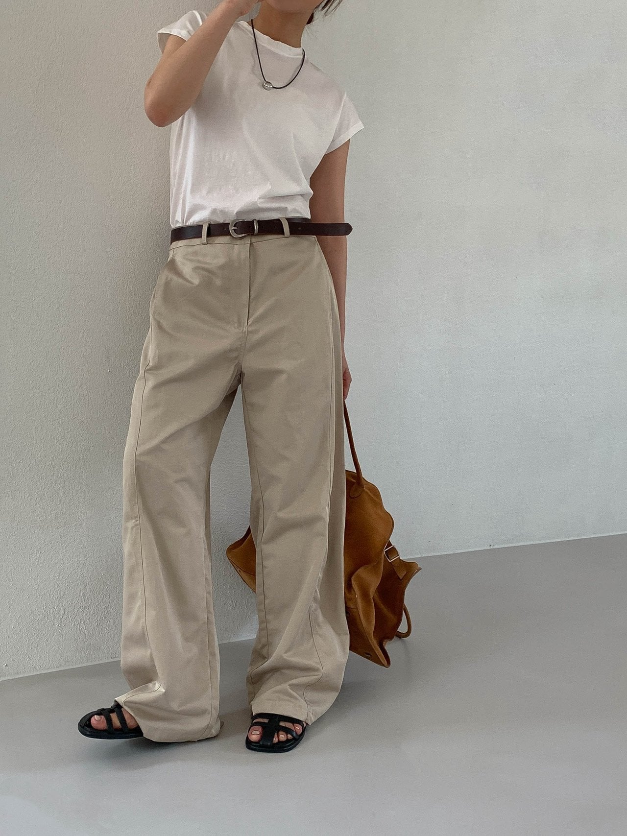 Moment curved seam wide leg pants in White, front view close-up waistband and seam detail