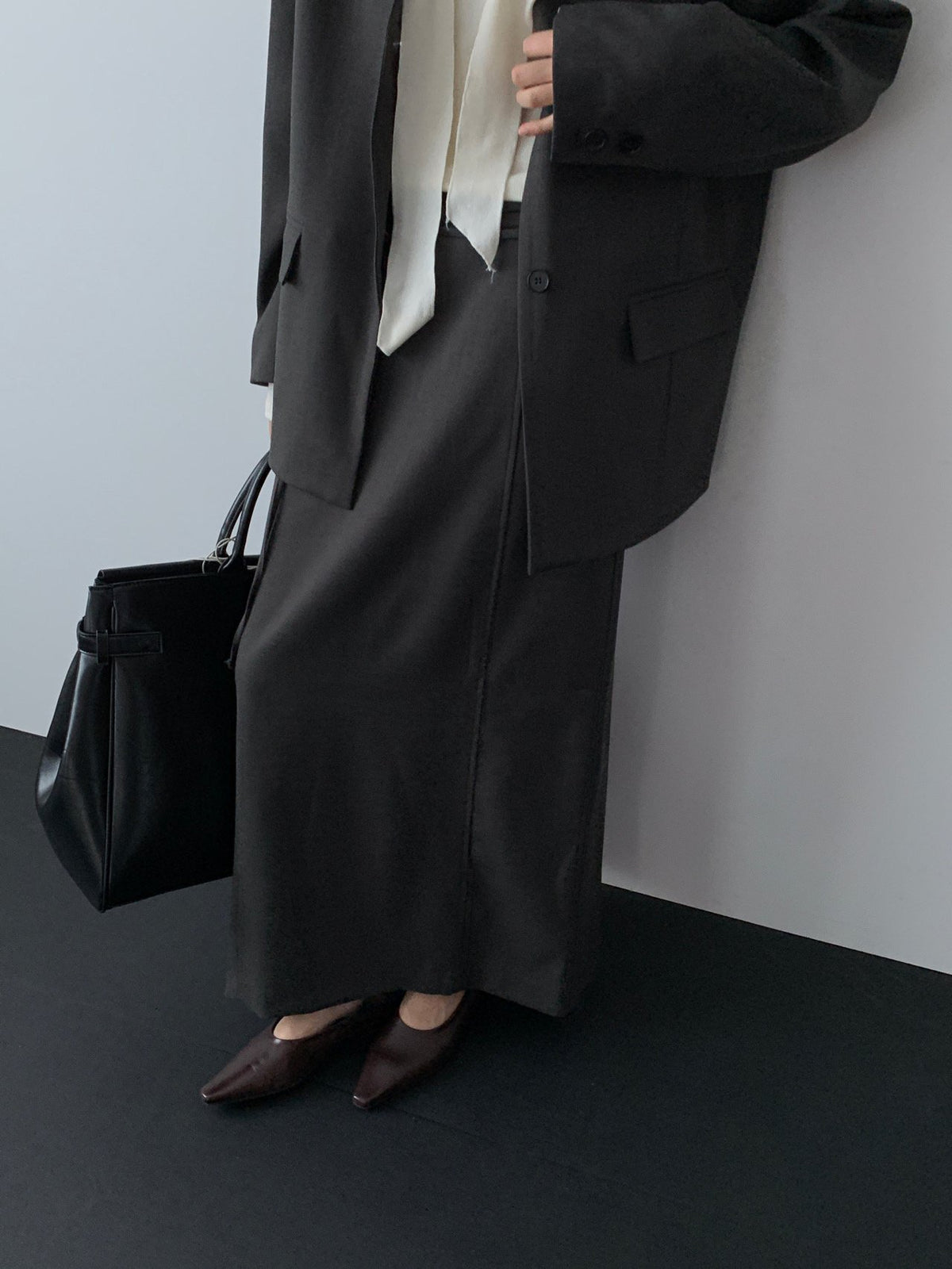 Close-up of Lucysalon Khaki Brown long skirt waist and tie detail