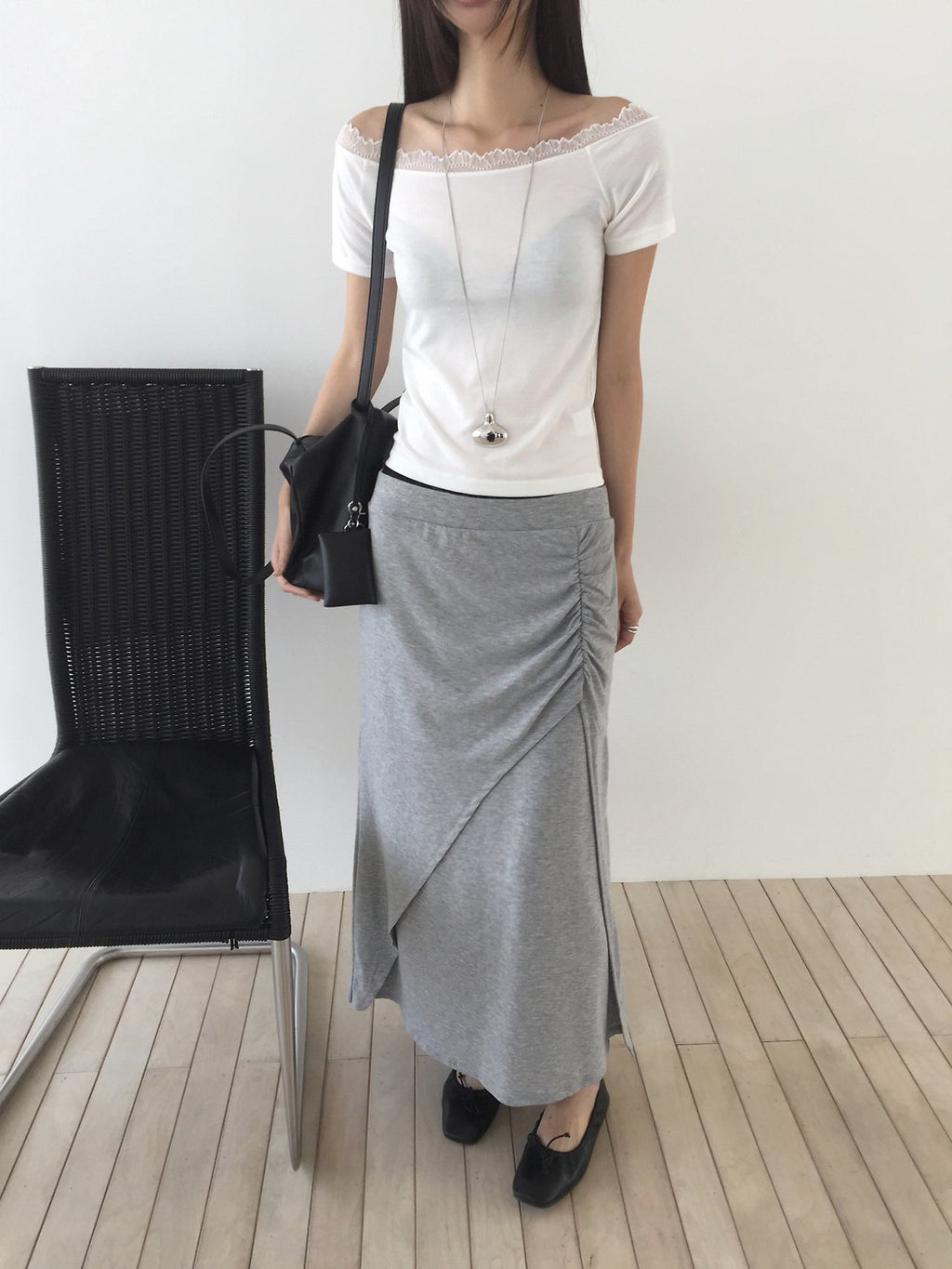 Nweol side ruched maxi skirt in Grey, Charcoal and Black, three colorways product flat lay on white surface