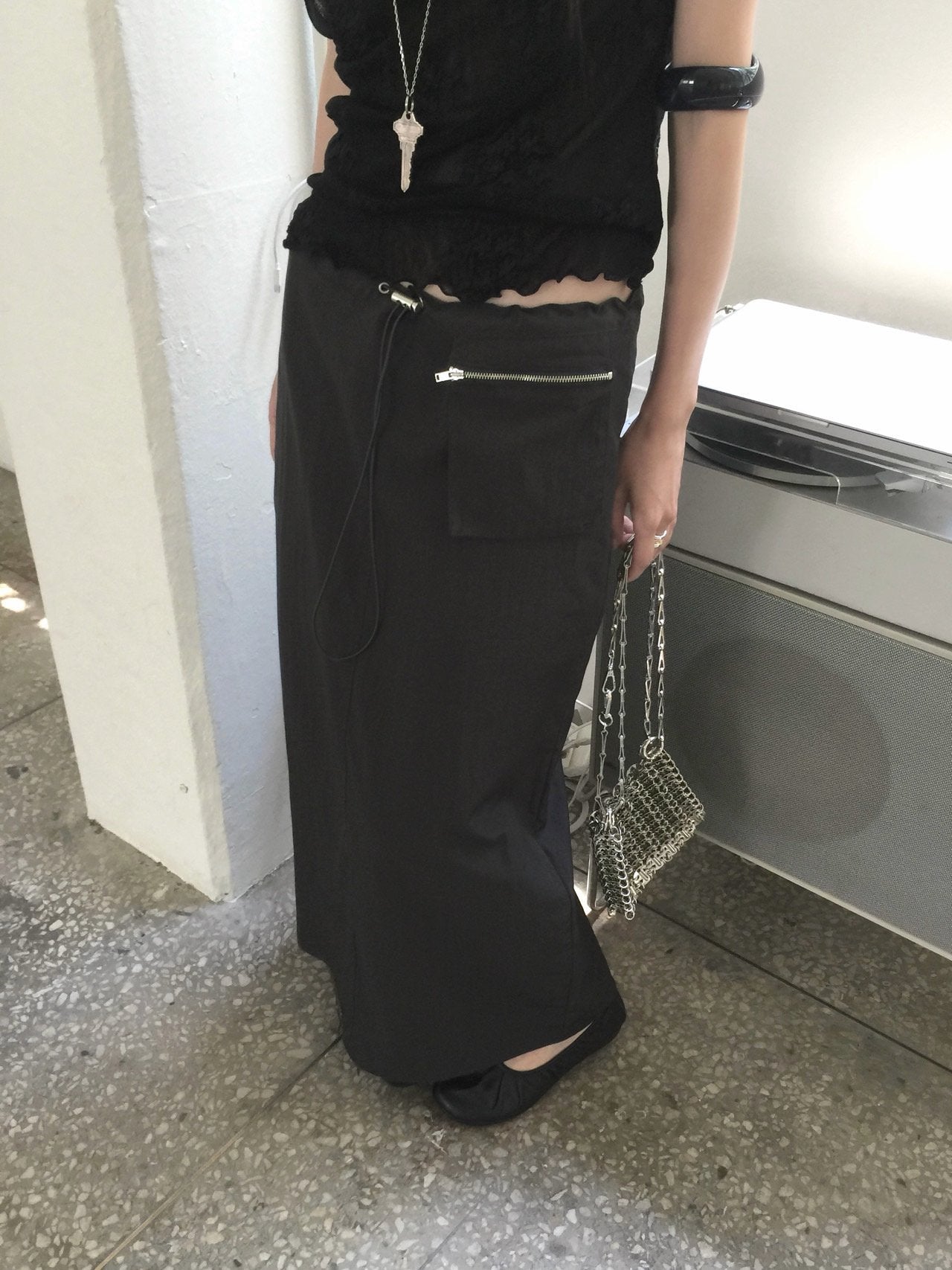 Nweol low rise zip pocket maxi skirt in Black, product flat lay front view